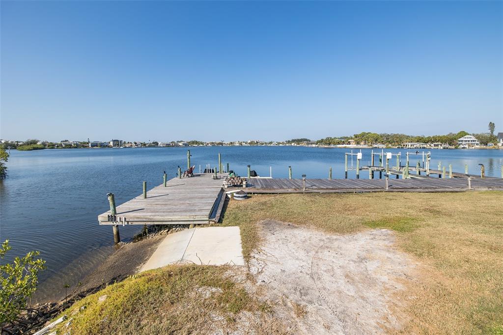 8211 Hayward Lane Port Richey, FL 34668 - Photo 48 of 65 a view of a lake with houses in the back