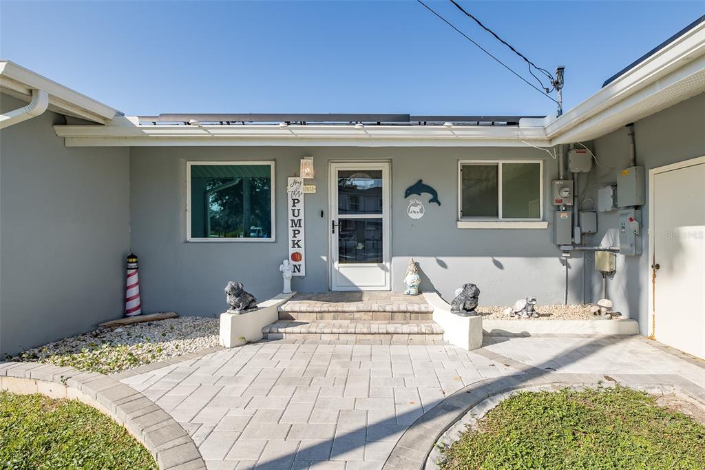 8211 Hayward Lane Port Richey, FL 34668 - Photo 5 of 65 a view of a dinning table and chairs in the patio