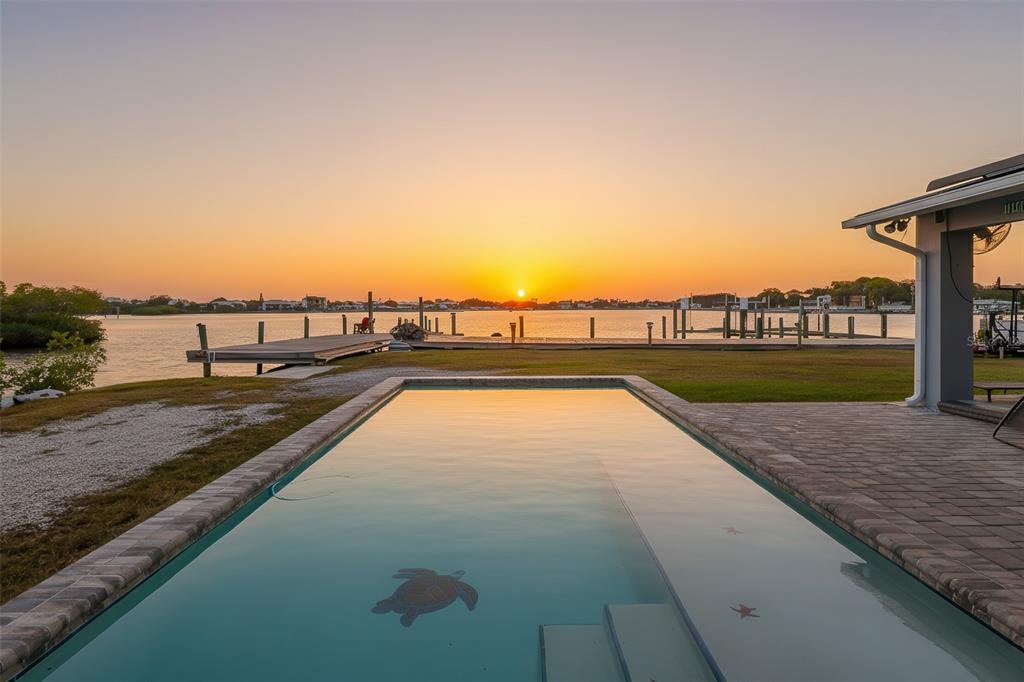 8211 Hayward Lane Port Richey, FL 34668 - Photo 65 of 65 a view of swimming pool with a lounge chair