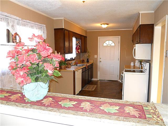 836 Cowan Road Dickson, TN 37055 - Photo 12 of 20 The pass-through from the living room to the kitchen & dining areas.