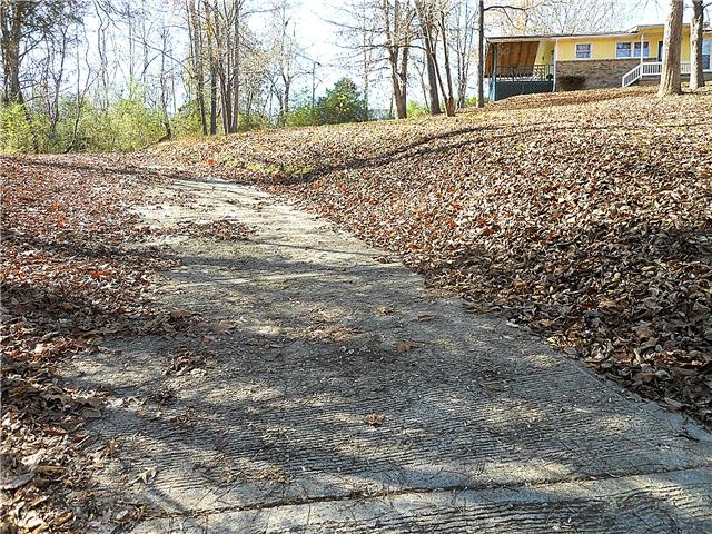 836 Cowan Road Dickson, TN 37055 - Photo 4 of 20 House is set way off the road with an excellent concrete driveway.