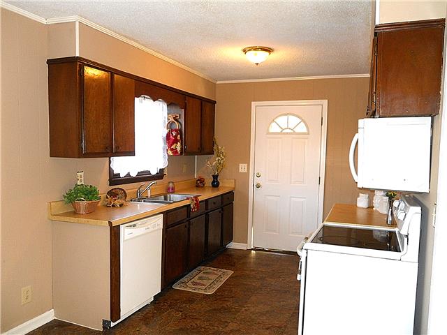 836 Cowan Road Dickson, TN 37055 - Photo 6 of 20 Cute kitchen comes with stove, microwave & dishwasher.