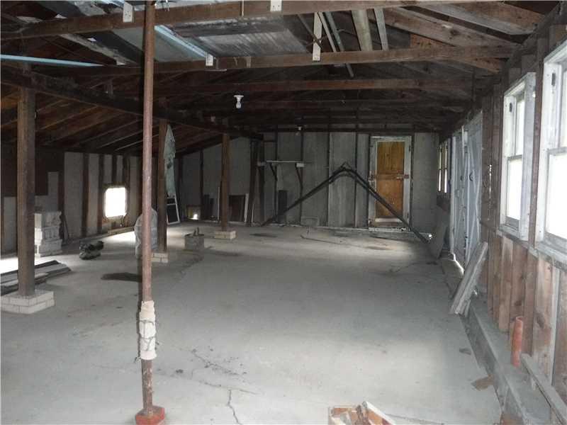 748 Lancaster Road Fombell, PA 16123 - Photo 8 of 25 Parking Lot/Garage. interior of larger garage/barn