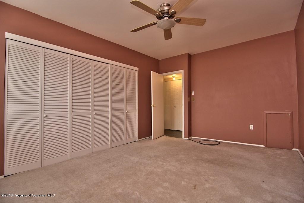 1610 Summit Pointe Scranton, PA 18508 - Photo 13 of 17 an empty room with a empty space and chandelier fan