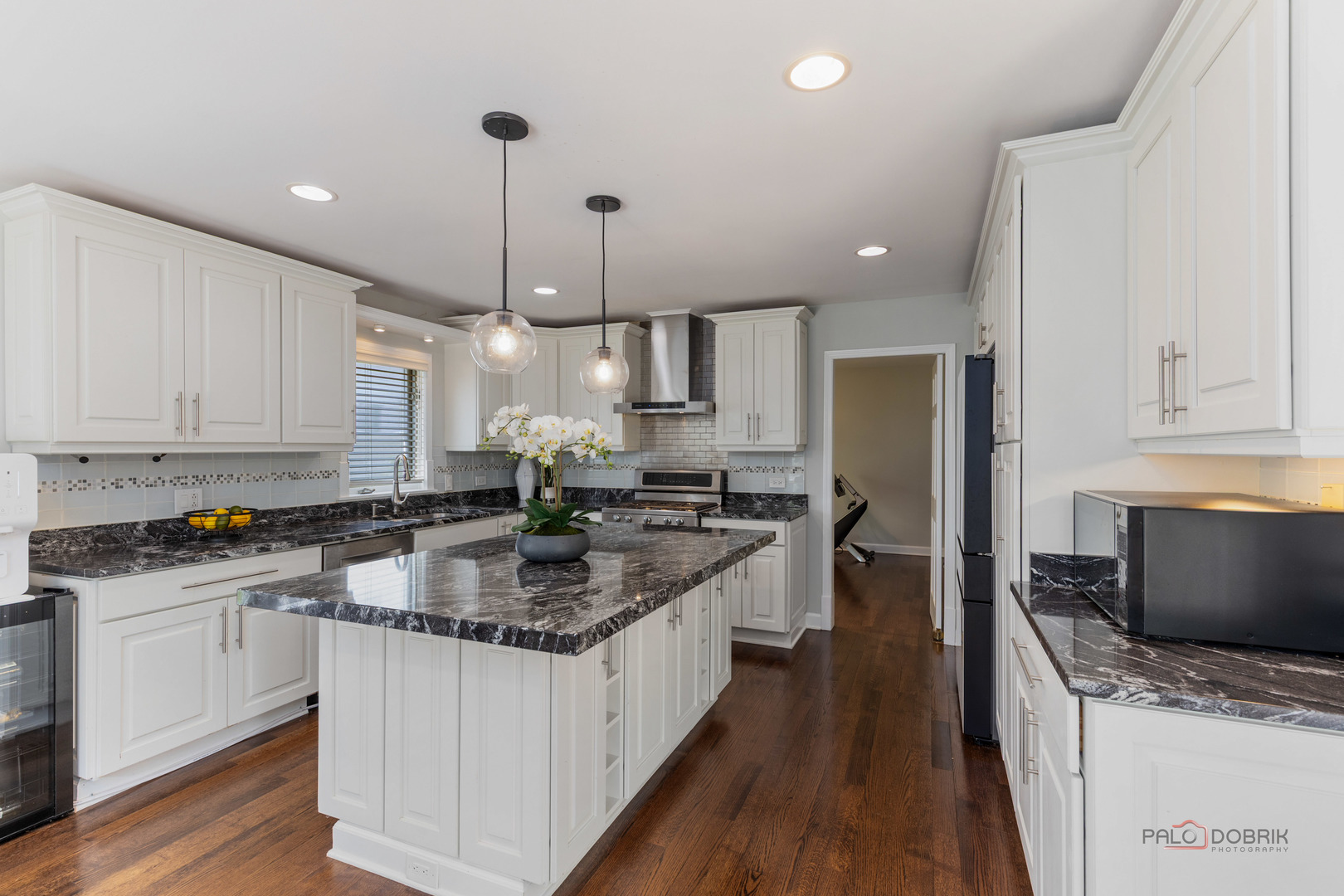 2965 Keystone Road Northbrook, IL 60062 - Photo 11 of 40 a kitchen with stainless steel appliances granite countertop a sink stove and refrigerator