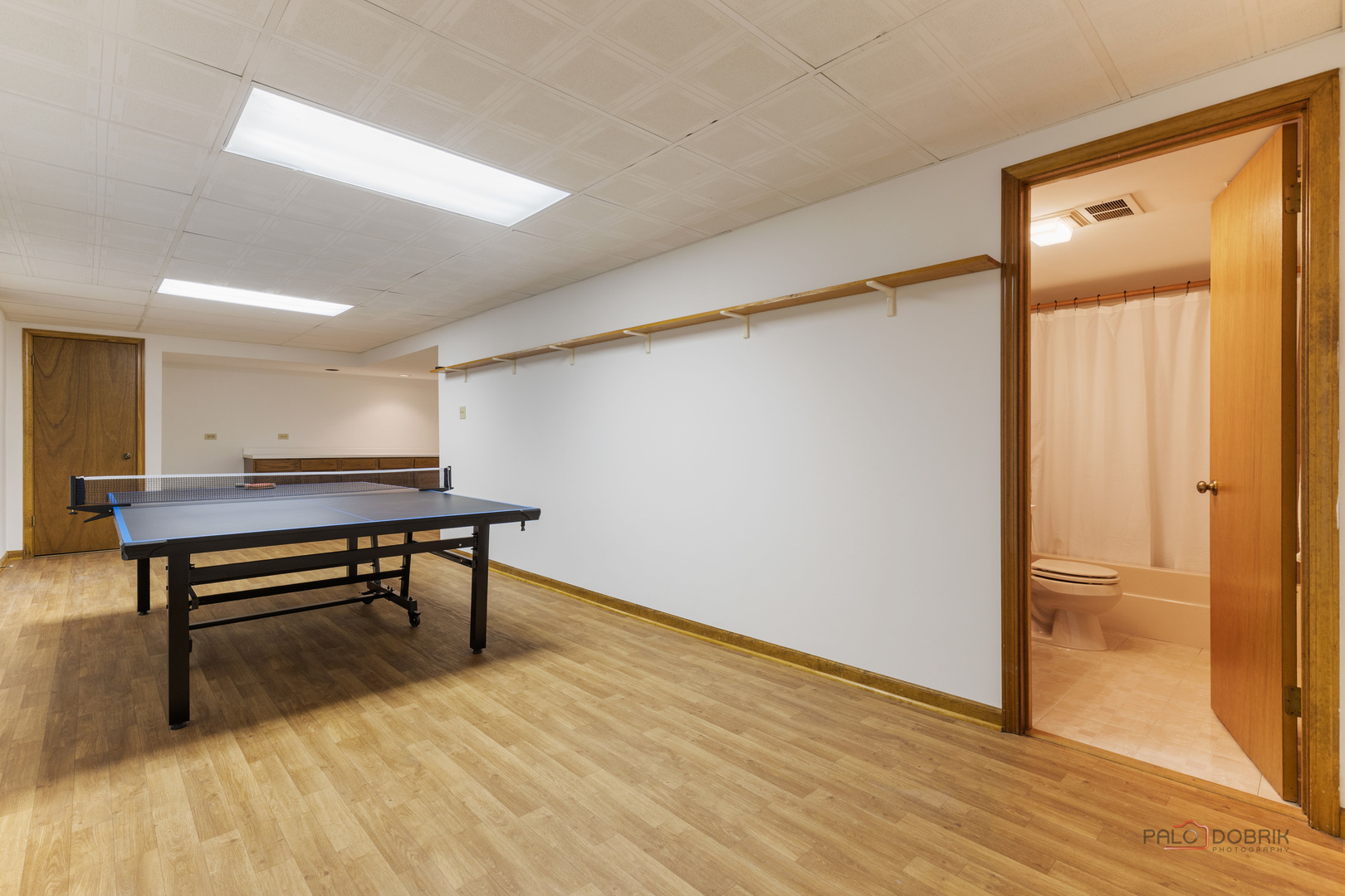 2965 Keystone Road Northbrook, IL 60062 - Photo 32 of 40 a view of a room with wooden floor furniture and windows