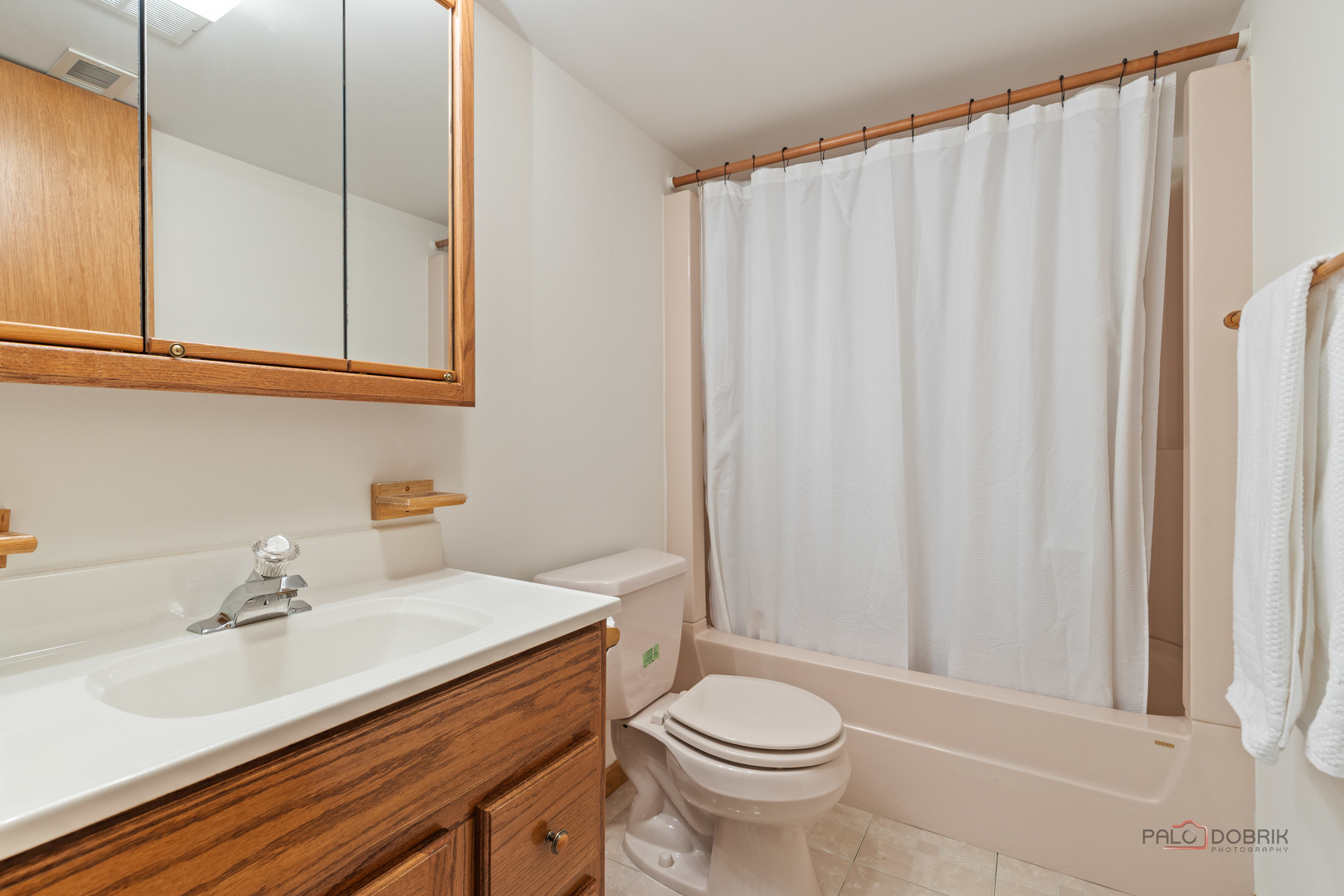 2965 Keystone Road Northbrook, IL 60062 - Photo 33 of 40 a bathroom with a sink a toilet and shower