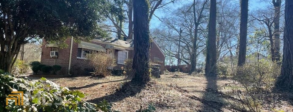 135 East Atlanta Road Stockbridge, GA 30281 - Photo 1 of 1 a view of a yard covered in snow