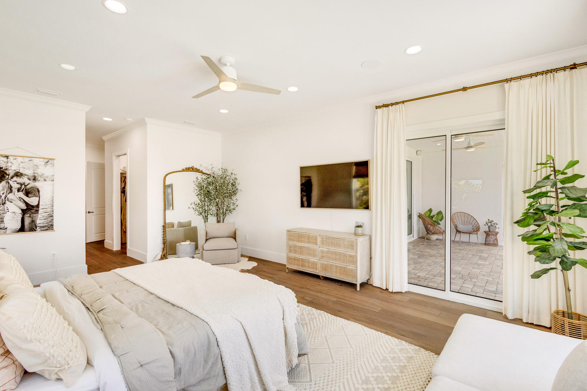 1341 Driftwood Point Road Santa Rosa Beach, FL 32459 - Photo 18 of 55 a bedroom with a large bed and a potted plant