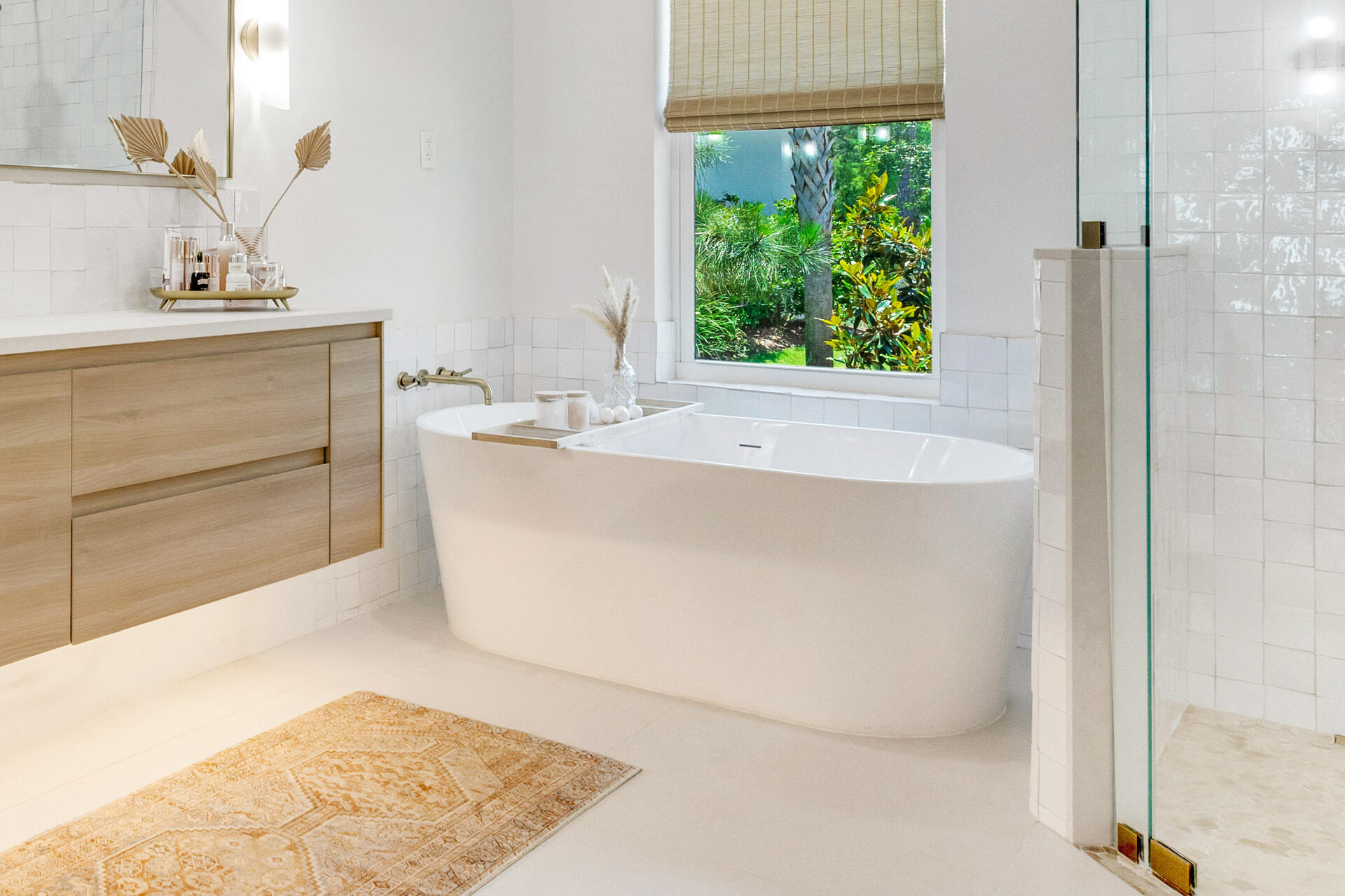 1341 Driftwood Point Road Santa Rosa Beach, FL 32459 - Photo 21 of 55 a bath tub sitting in a bathroom next to a window