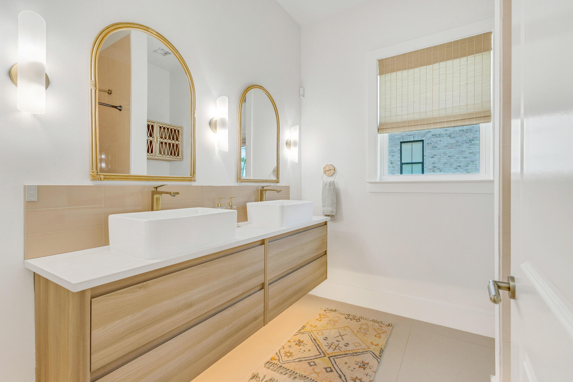 1341 Driftwood Point Road Santa Rosa Beach, FL 32459 - Photo 27 of 55 a spacious bathroom with a double vanity sink and a mirror