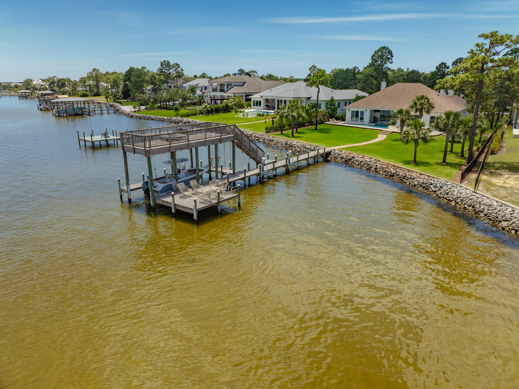1341 Driftwood Point Road Santa Rosa Beach, FL 32459 - Photo 49 of 55 a view of a lake with a nearby beach