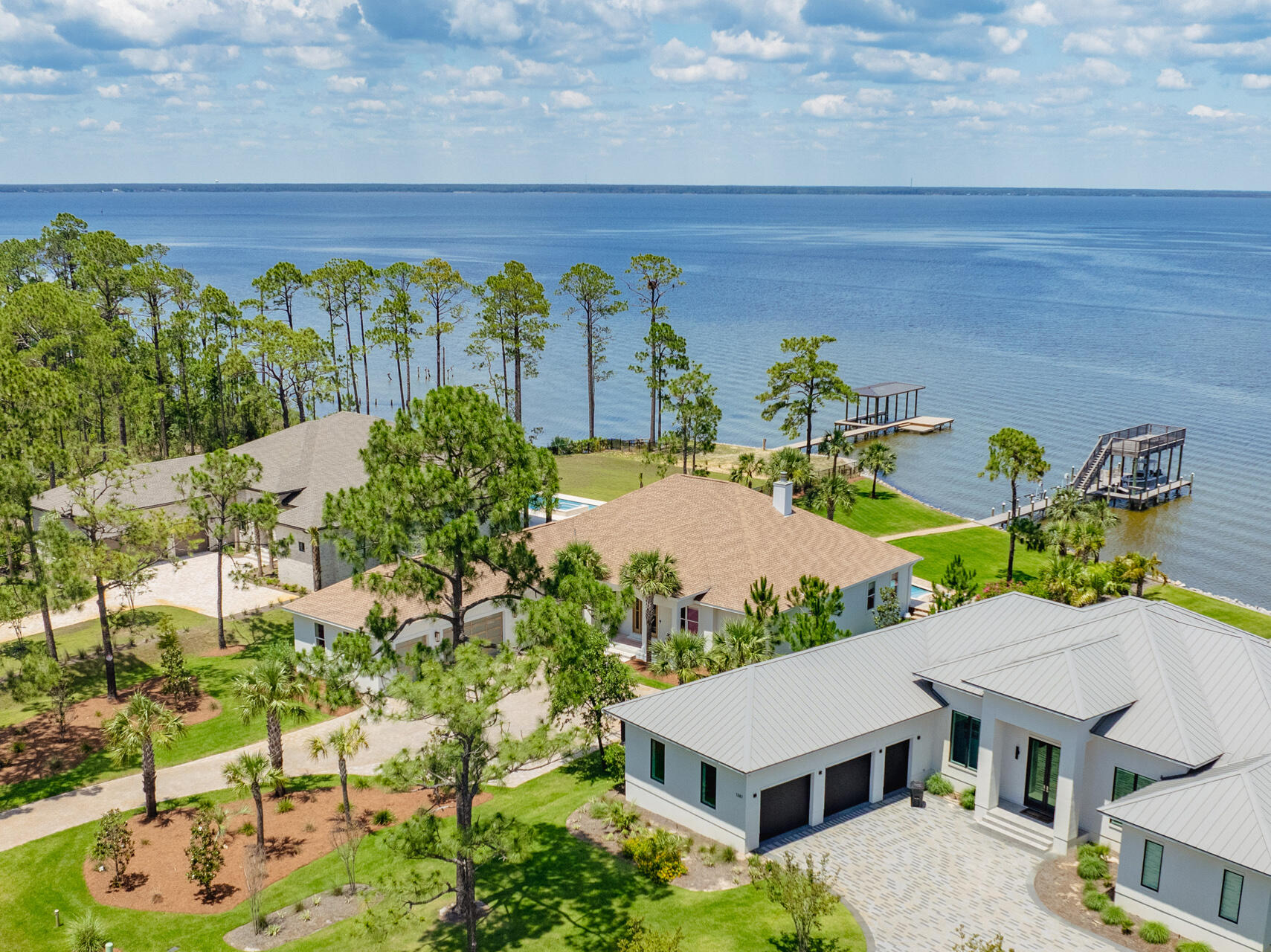 1341 Driftwood Point Road Santa Rosa Beach, FL 32459 - Photo 54 of 55 a view of a swimming pool with a patio