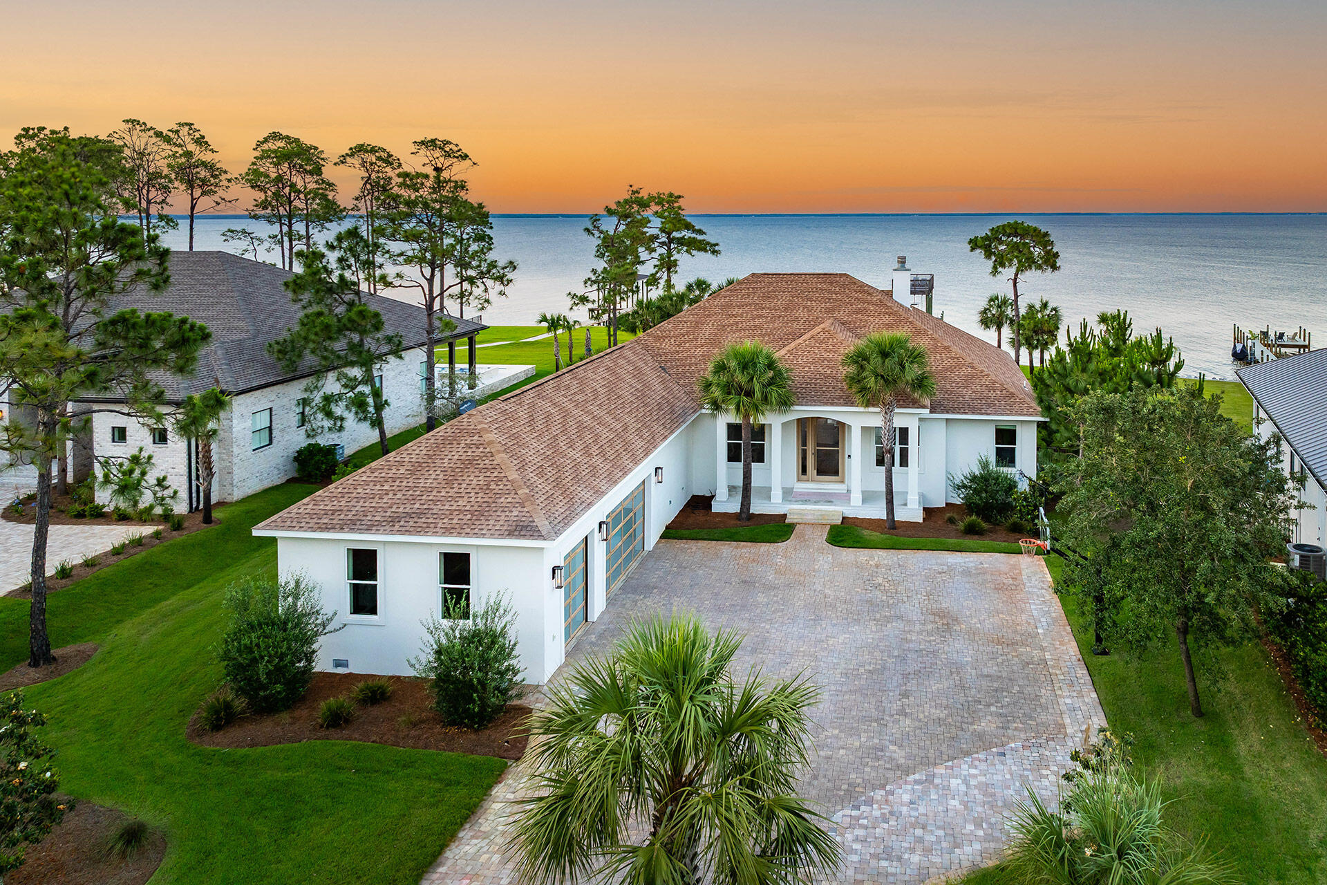 1341 Driftwood Point Road Santa Rosa Beach, FL 32459 - Photo 6 of 55 a aerial view of a house with a yard and potted plants