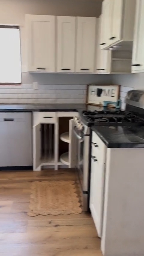 6233 Sunny Fox Road Mountain View, AR 72560 - Photo 8 of 26 White shaker-style cabinetry with matte black hardware