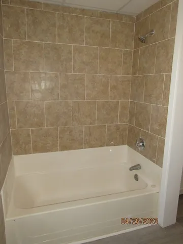 a bathroom with a bathtub