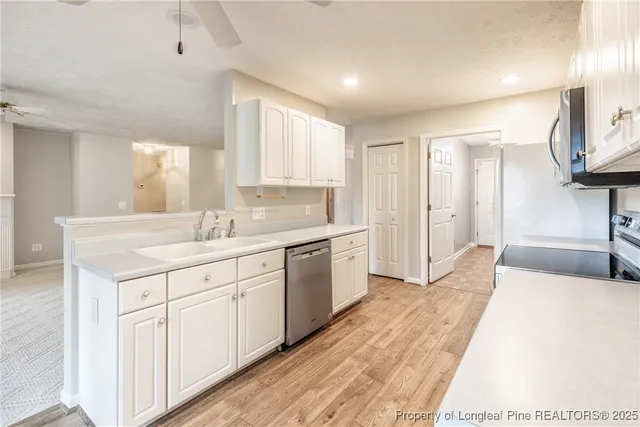 a spacious bathroom with a double vanity sink and a mirror