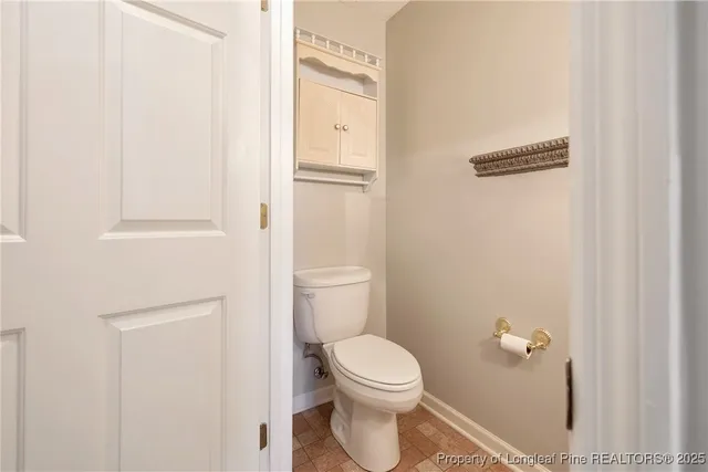 a bathroom with a toilet