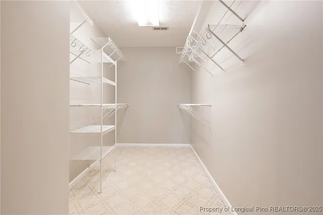 a view of small space with racks on the wall