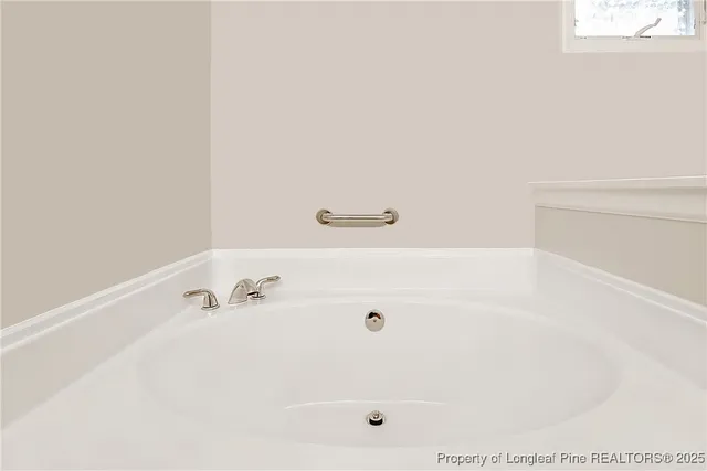 a bathroom with a bathtub