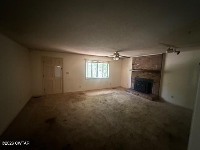 1400 Roper Road Bolivar, TN 38008 - Photo 8 of 23 a view of empty room with a fireplace