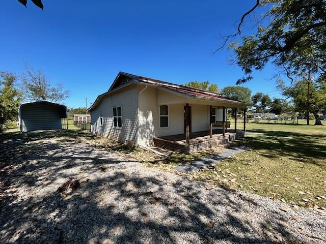 239 Ranch Road Joshua, TX 76058 - Photo 1 of 34 a view of a house with backyard and trees