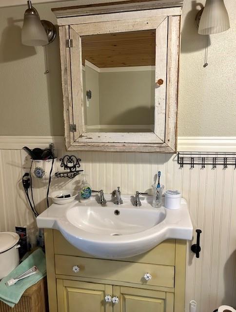 239 Ranch Road Joshua, TX 76058 - Photo 22 of 34 a bathroom with a sink and a mirror