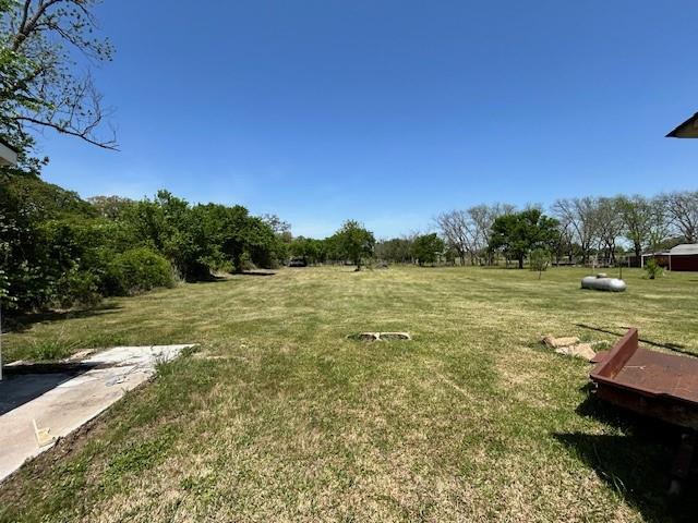 239 Ranch Road Joshua, TX 76058 - Photo 26 of 34 a view of a lake with a yard