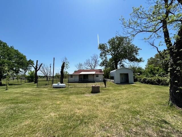 239 Ranch Road Joshua, TX 76058 - Photo 27 of 34 a view of a house with a yard and sitting area