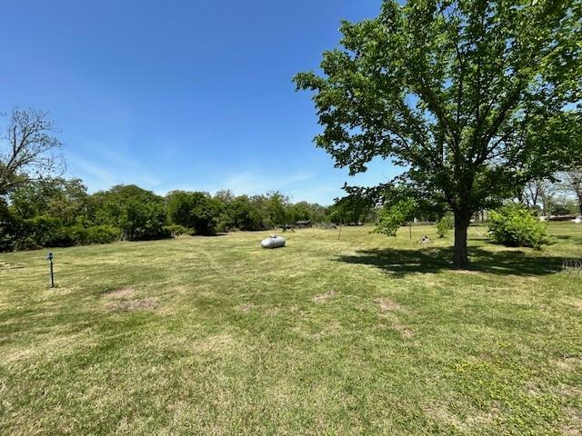 239 Ranch Road Joshua, TX 76058 - Photo 30 of 34 a view of field with trees in the background