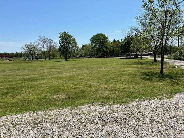 239 Ranch Road Joshua, TX 76058 - Photo 34 of 34 a view of outdoor space with green field and trees