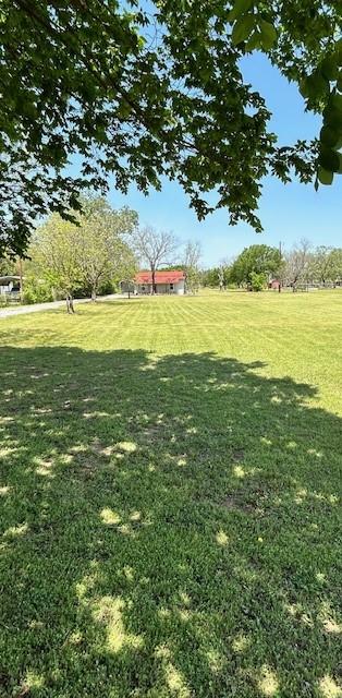 239 Ranch Road Joshua, TX 76058 - Photo 5 of 34 a view of an ocean and a yard