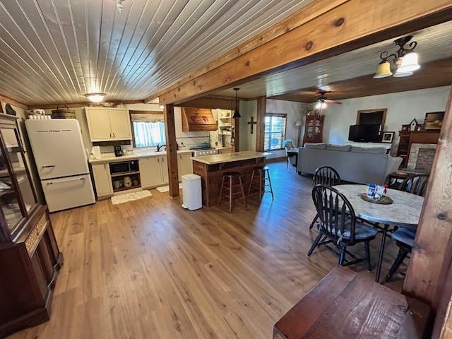 239 Ranch Road Joshua, TX 76058 - Photo 10 of 34 a view of a dining room with furniture window and wooden floor