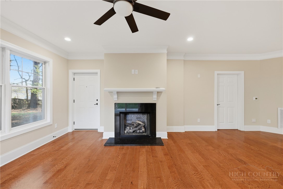 155 Gateway Drive, Unit 101 Boone, NC 28607 - Photo 12 of 50 a view of empty room with a fireplace