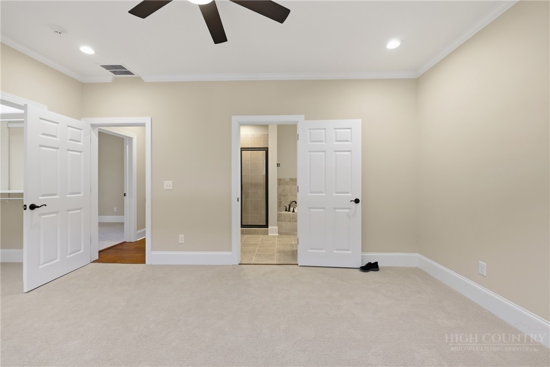 155 Gateway Drive, Unit 101 Boone, NC 28607 - Photo 23 of 50 an empty room with closet and windows