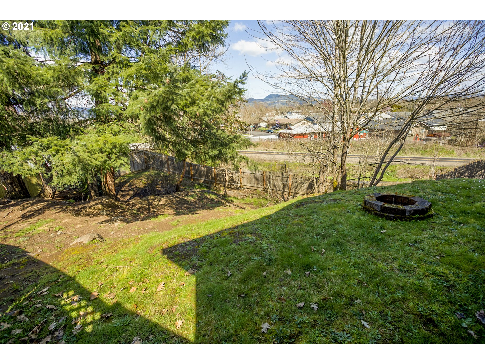 539 South 48th Place Springfield, OR 97478 - Photo 28 of 32 a view of a yard with an outdoor space