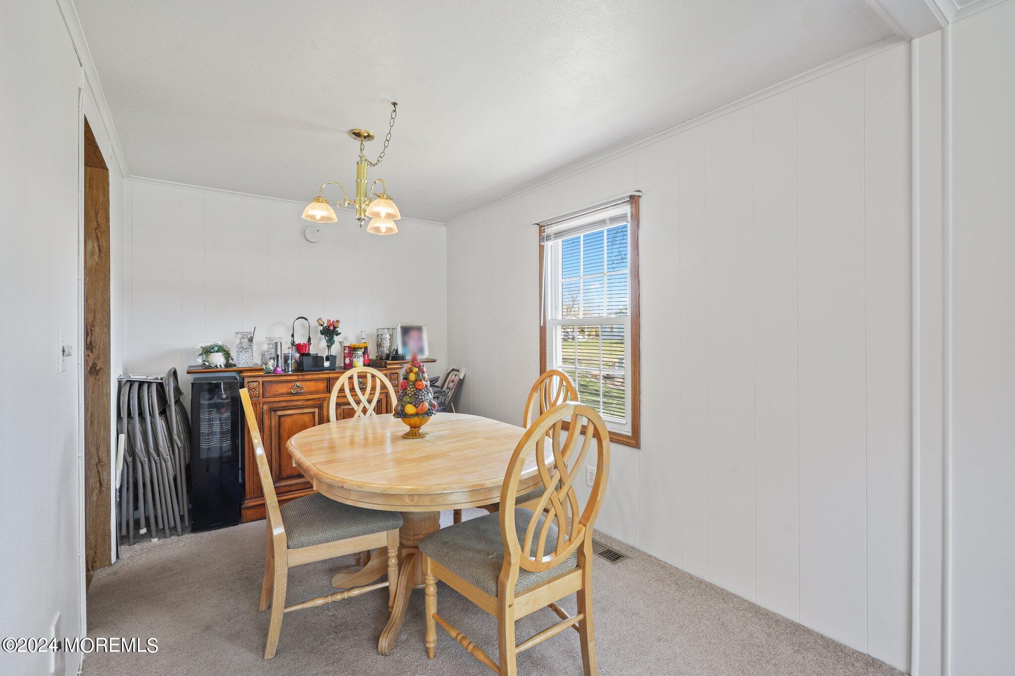 497 Rosalind Road Freehold, NJ 07728 - Photo 15 of 23 a dining room with furniture and window