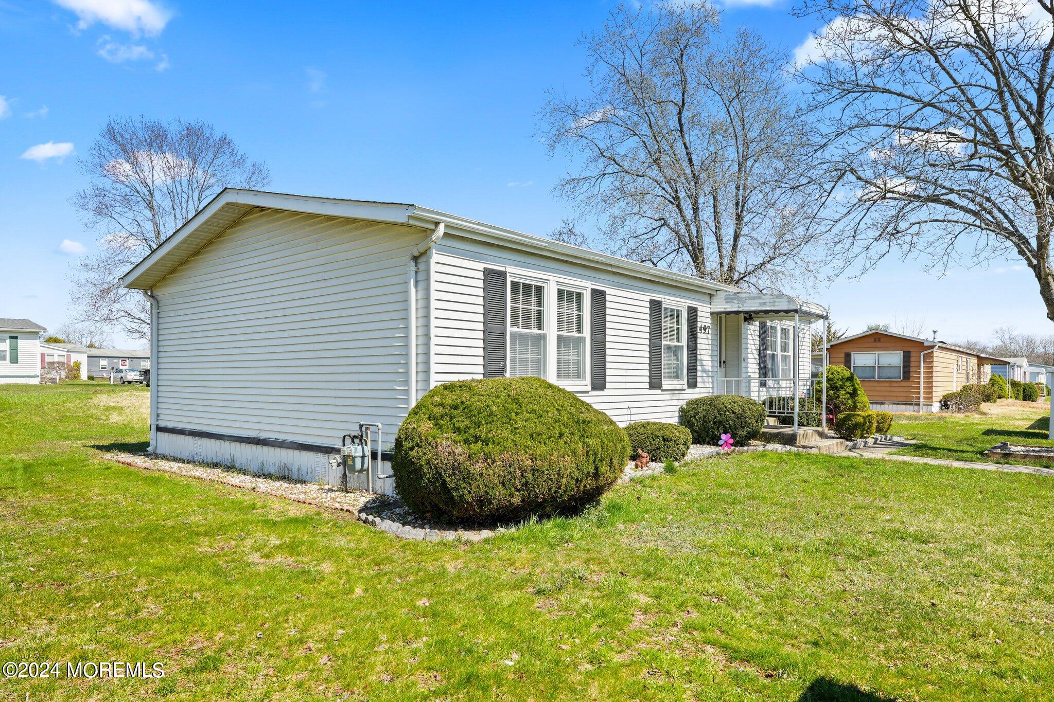 497 Rosalind Road Freehold, NJ 07728 - Photo 23 of 23 a view of a house with a backyard
