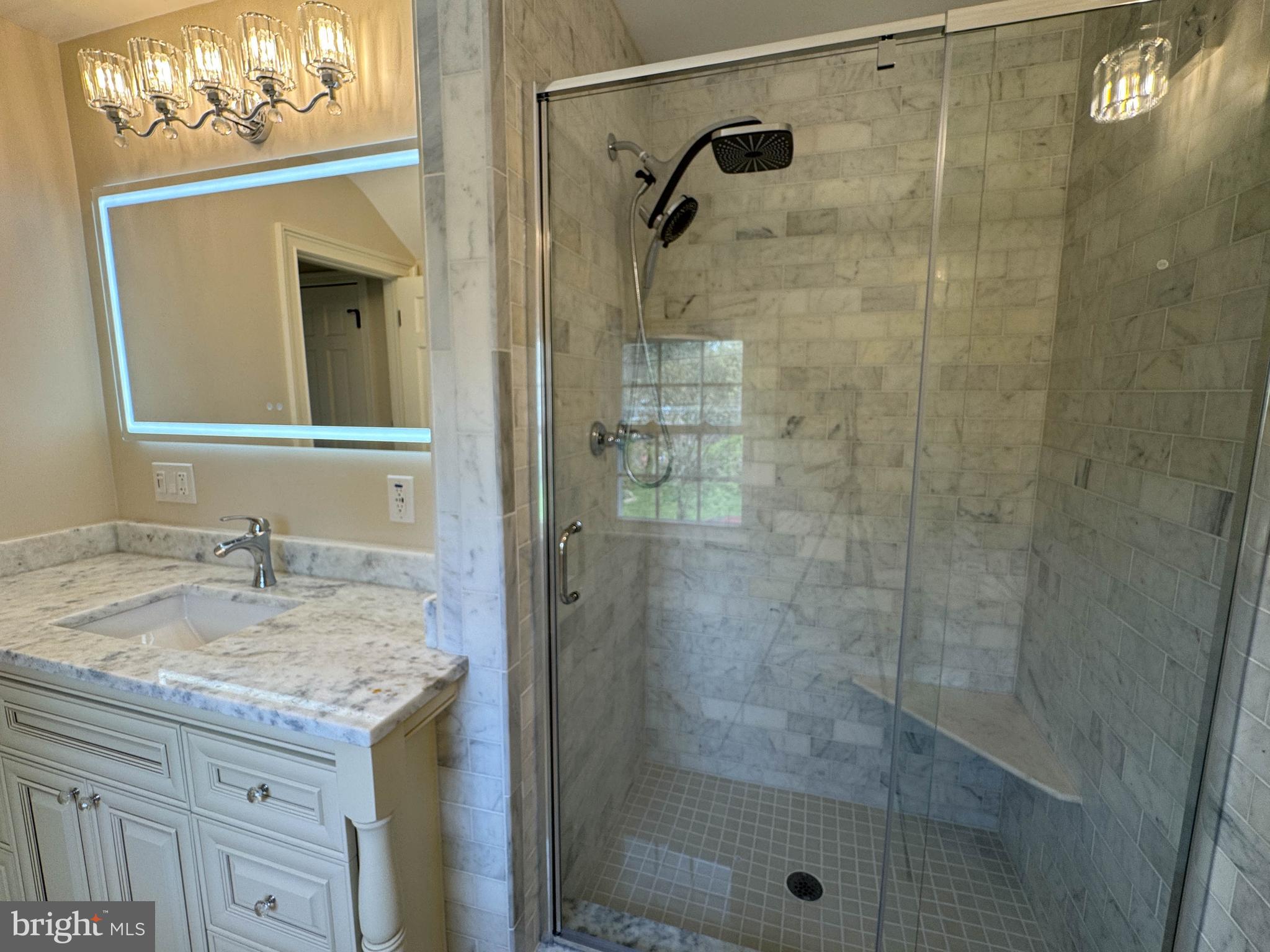 9421 Thornhill Road Silver Spring, MD 20901 - Photo 27 of 42 Primary shower with seat