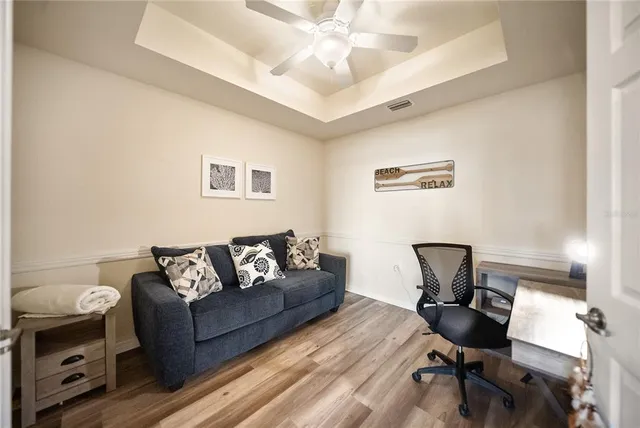 a spacious bathroom with a shower sink and mirror