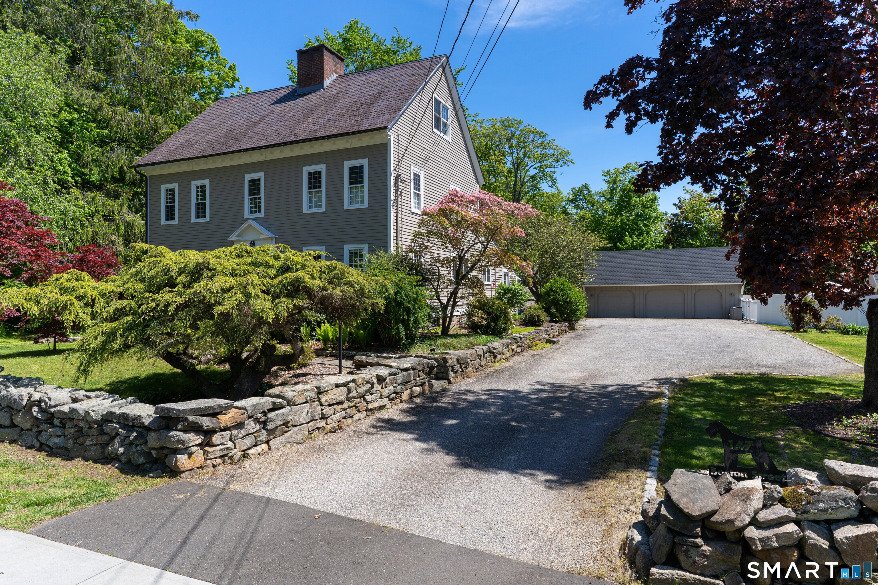147 Boston Street Guilford, CT 06437 - Photo 1 of 38 a view of a front of house with a yard