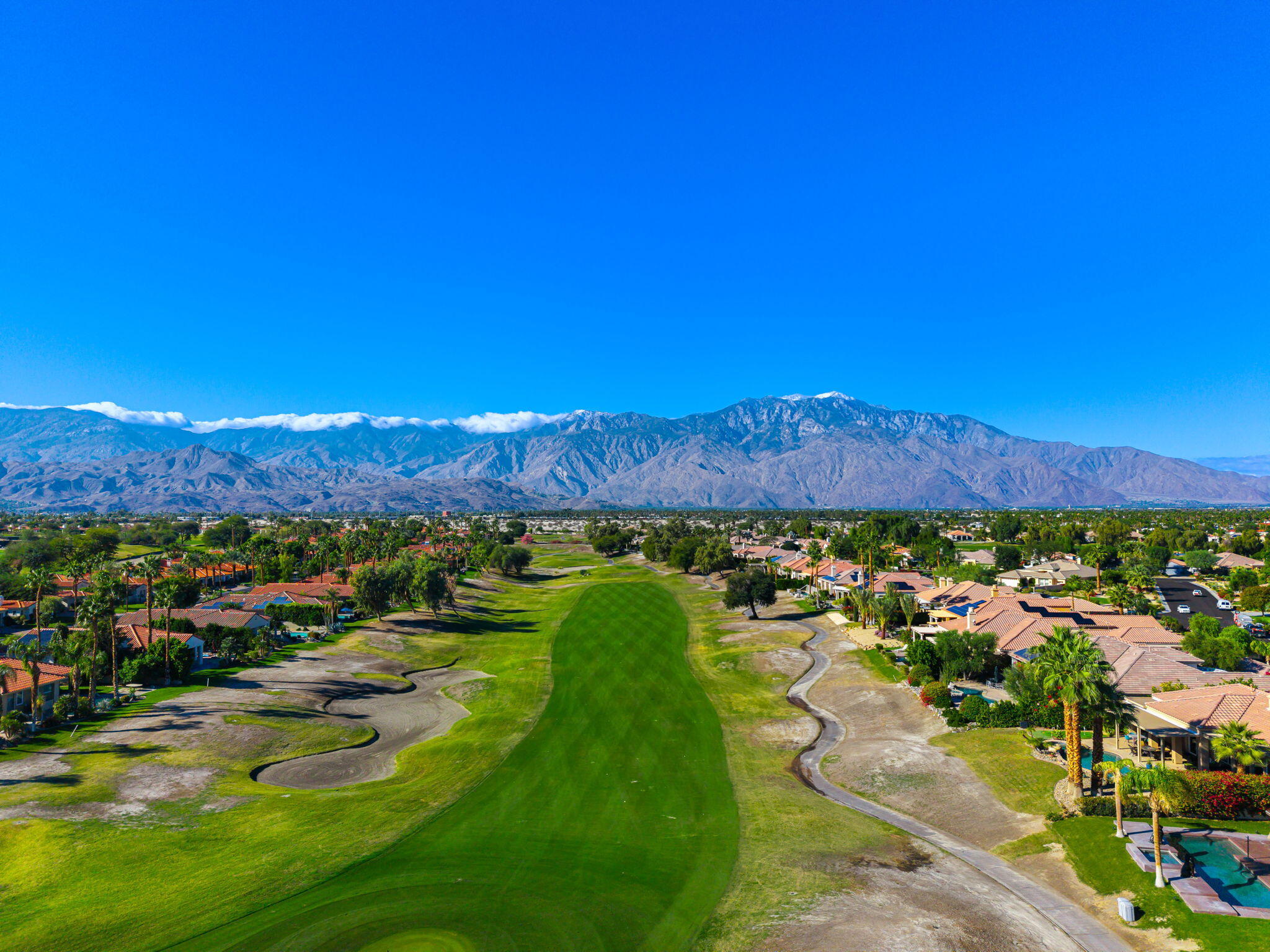 96 Vía Bella Rancho Mirage, CA 92270 - Photo 11 of 60 a view of a city with mountains in the background