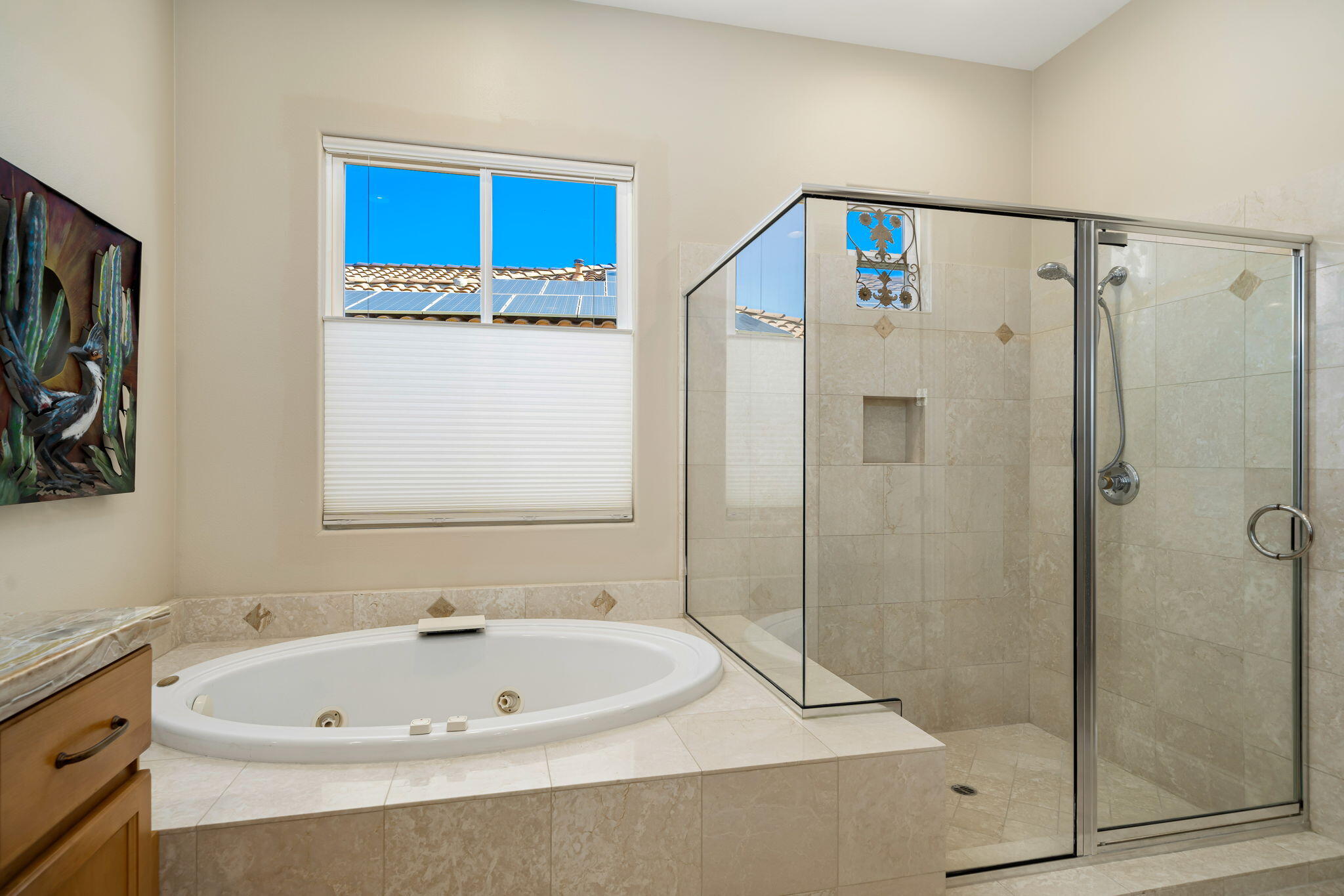 96 Vía Bella Rancho Mirage, CA 92270 - Photo 19 of 60 a bathroom with a white bath tub and a shower