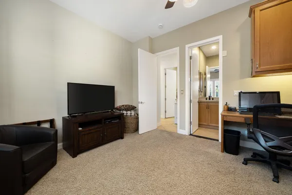 a view of a swimming pool and lounge chair