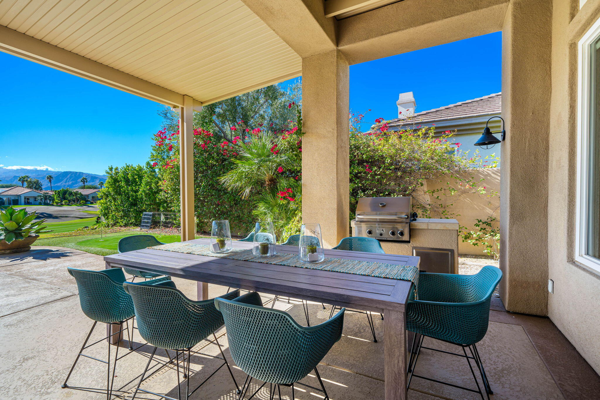 96 Vía Bella Rancho Mirage, CA 92270 - Photo 26 of 60 a view of an outdoor sitting area with furniture and backyard