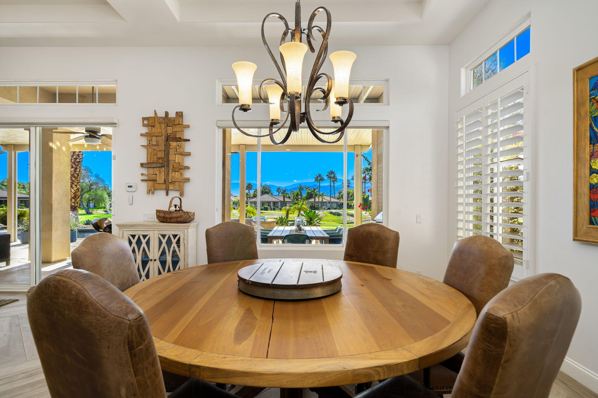 96 Vía Bella Rancho Mirage, CA 92270 - Photo 34 of 60 a view of a dining room with furniture window and outside view