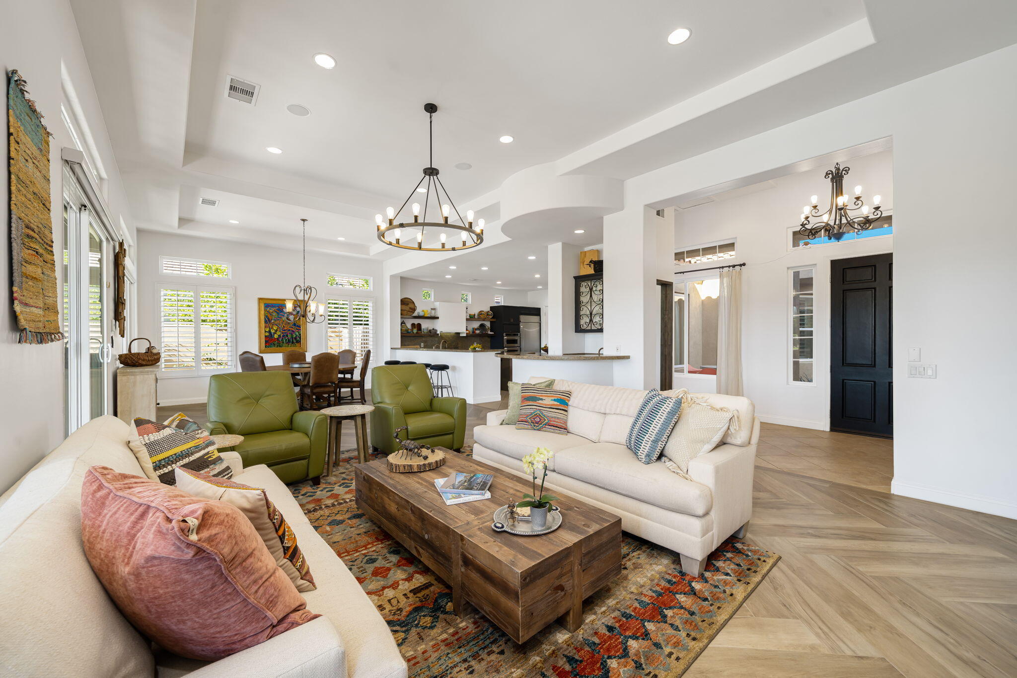 96 Vía Bella Rancho Mirage, CA 92270 - Photo 46 of 60 a living room with furniture and a chandelier