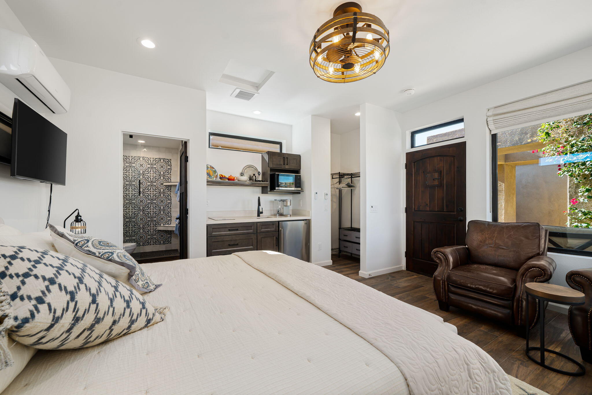 96 Vía Bella Rancho Mirage, CA 92270 - Photo 51 of 60 a bedroom with a bed and a television