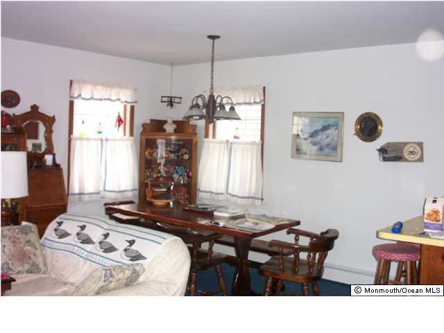 59 Spray Way Lavallette, NJ 08735 - Photo 5 of 7 a living room with furniture and window