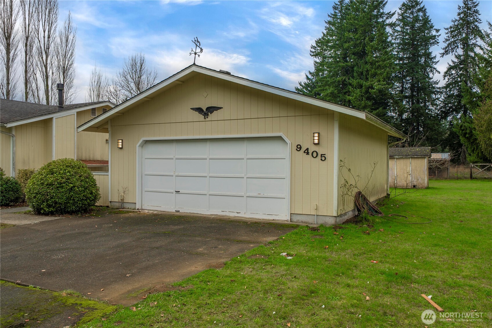 9405 Rich Road Southeast Olympia, WA 98501 - Photo 14 of 25 a view of a backyard of the house